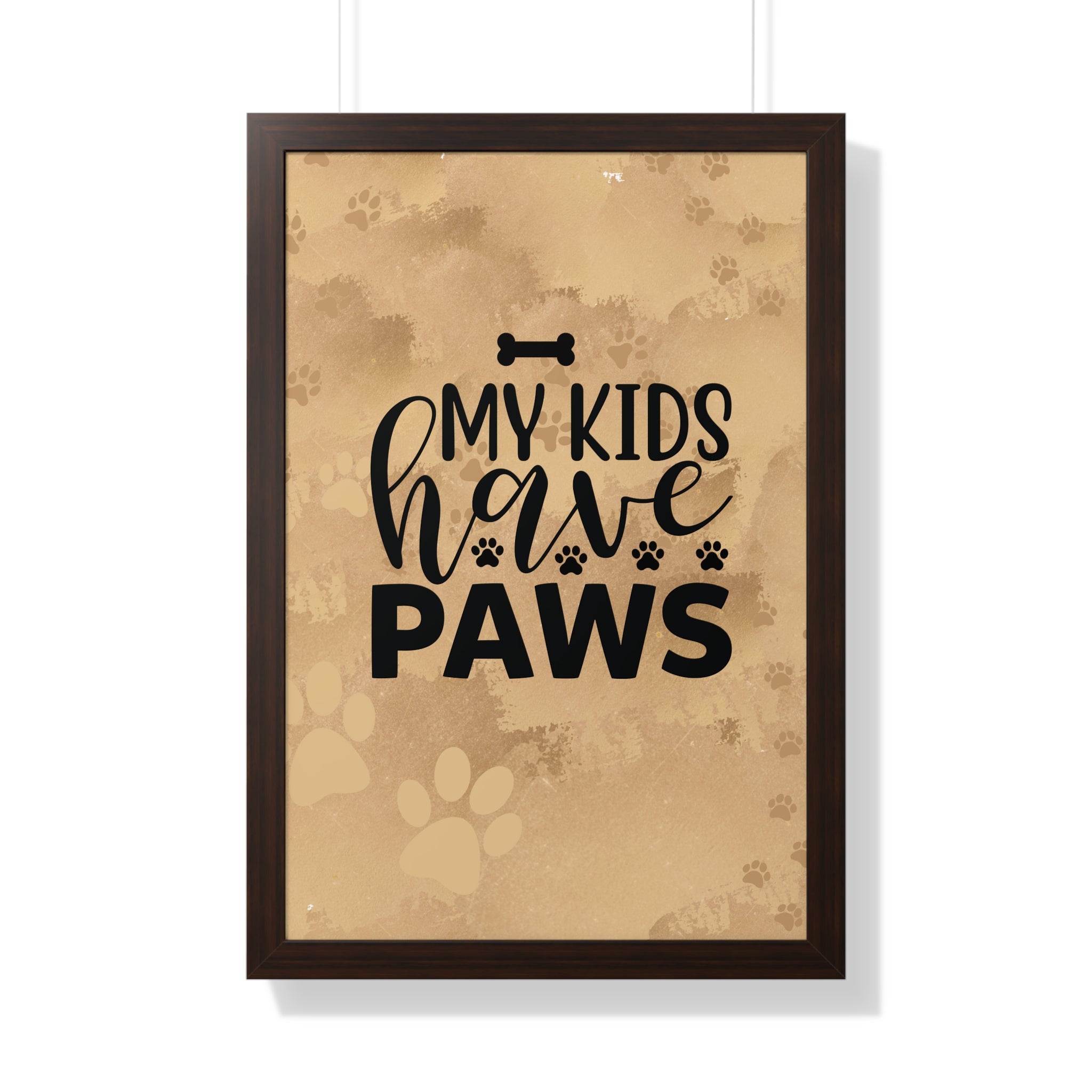 Framed poster with 'My kids have paws' text on a brown background with paw prints.