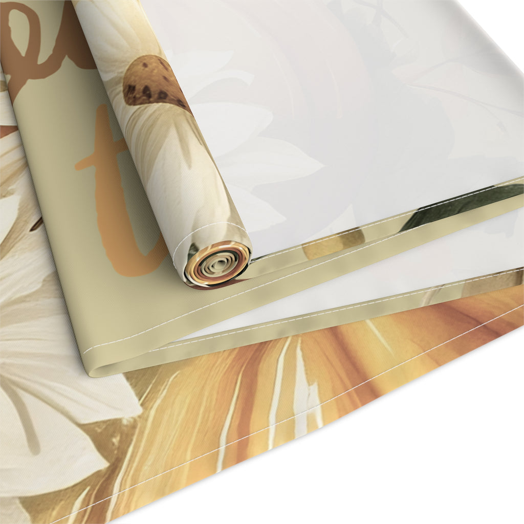 Roll of marbled paper with gold accents on a white surface