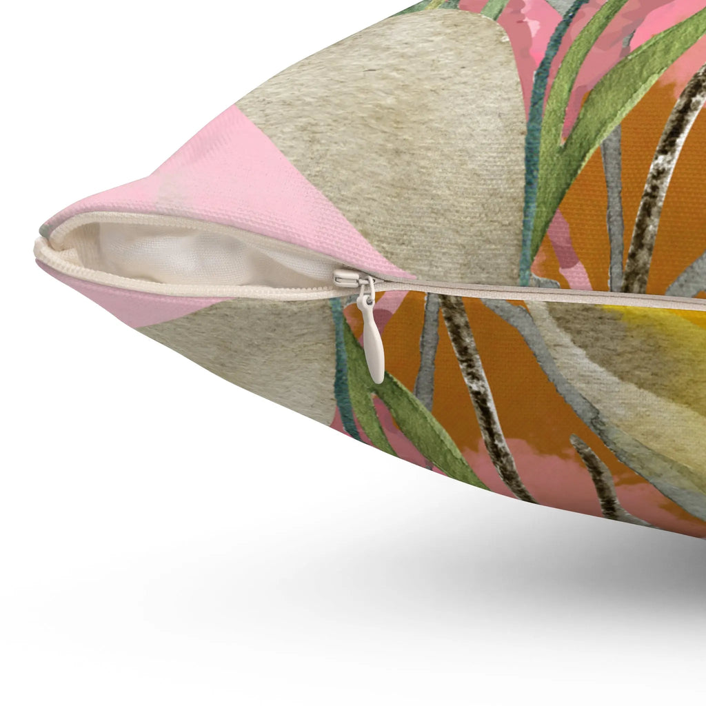 Decorative pillow with a colorful leaf pattern on a white background