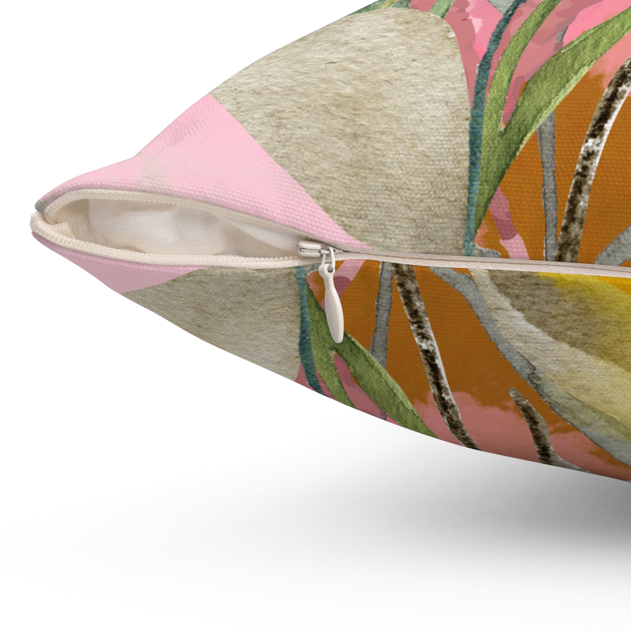 Decorative pillow with a colorful leaf pattern on a white background