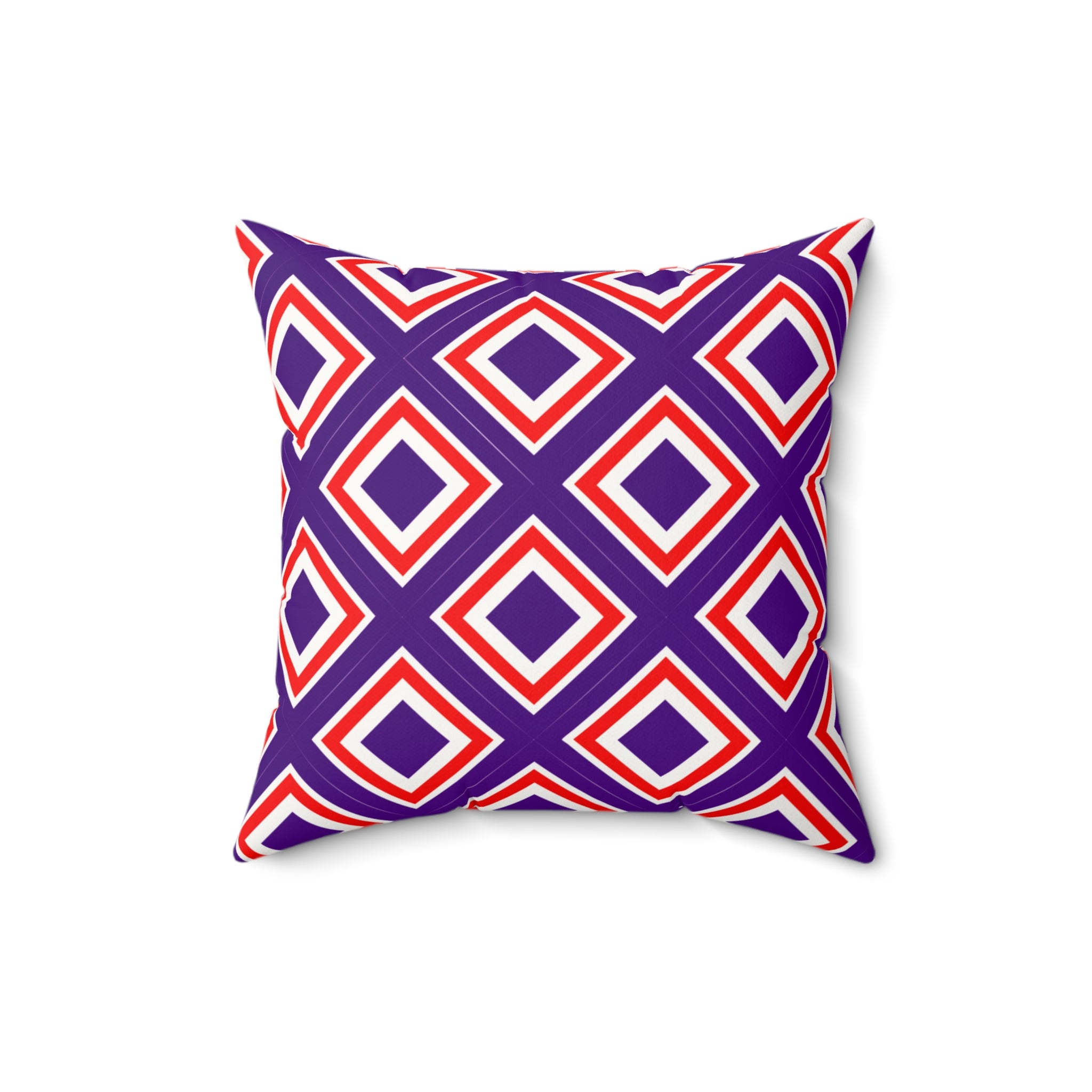 Decorative pillow with red and purple geometric pattern on a white background
