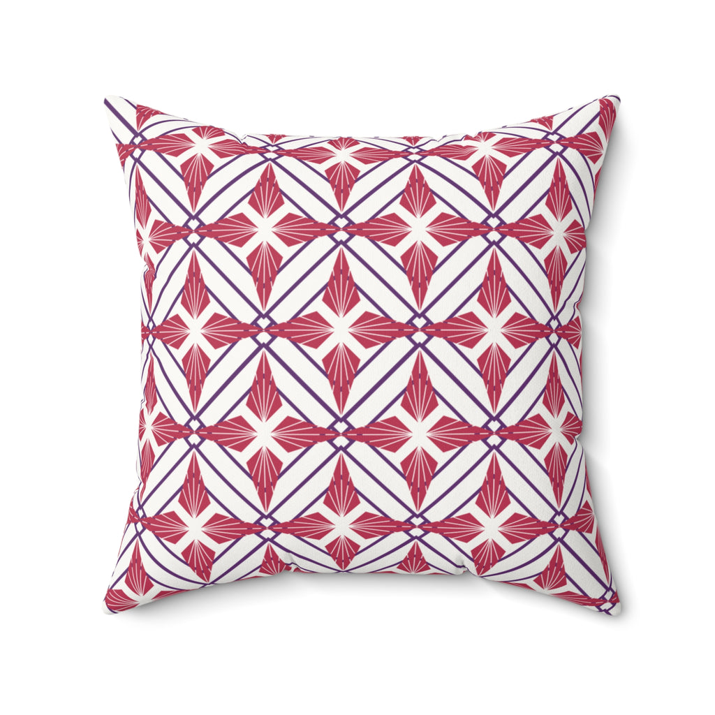Decorative pillow with red and white geometric pattern on a white background