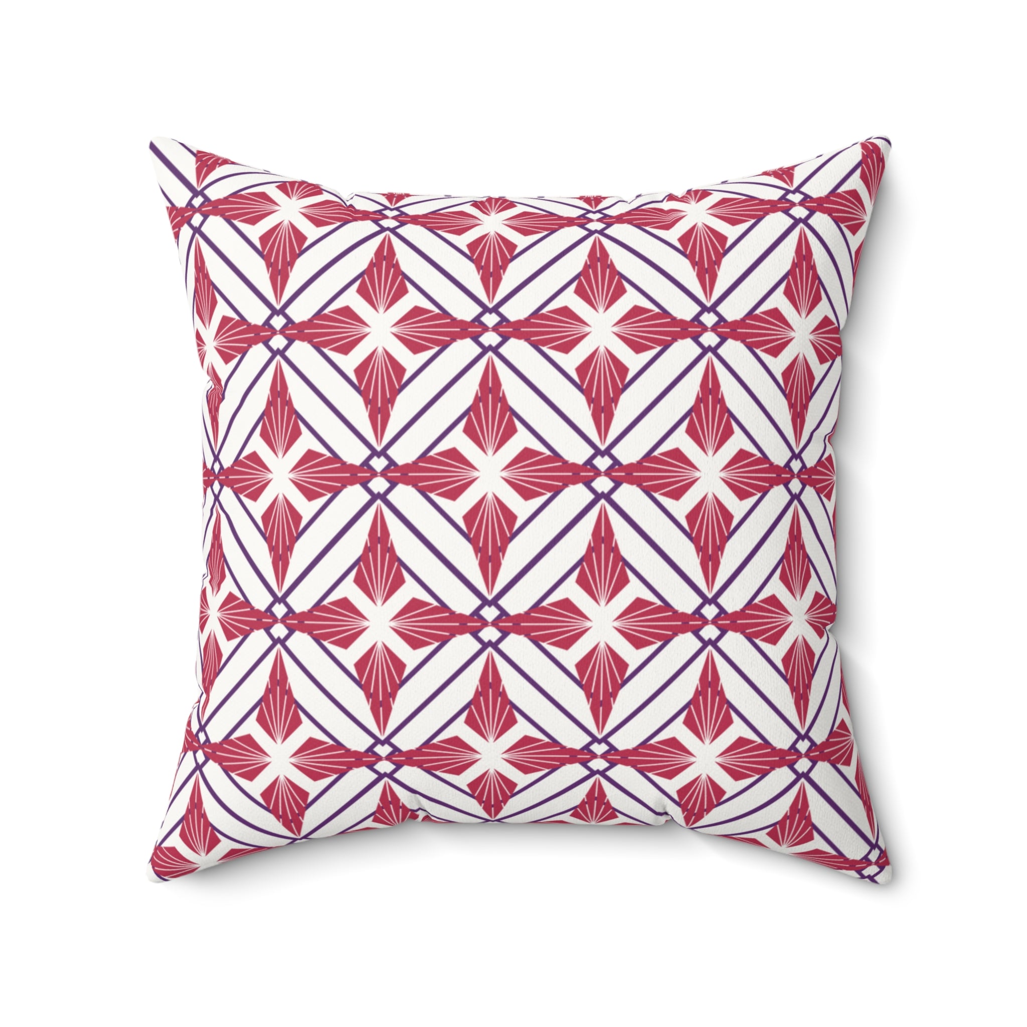 Decorative pillow with red and white geometric pattern on a white background