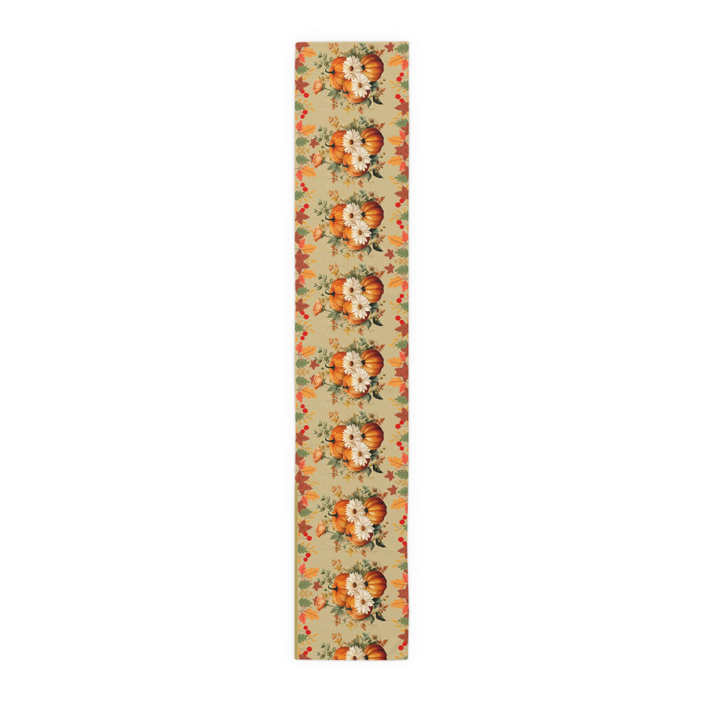 Decorative table runner with floral and pumpkin design on a beige background