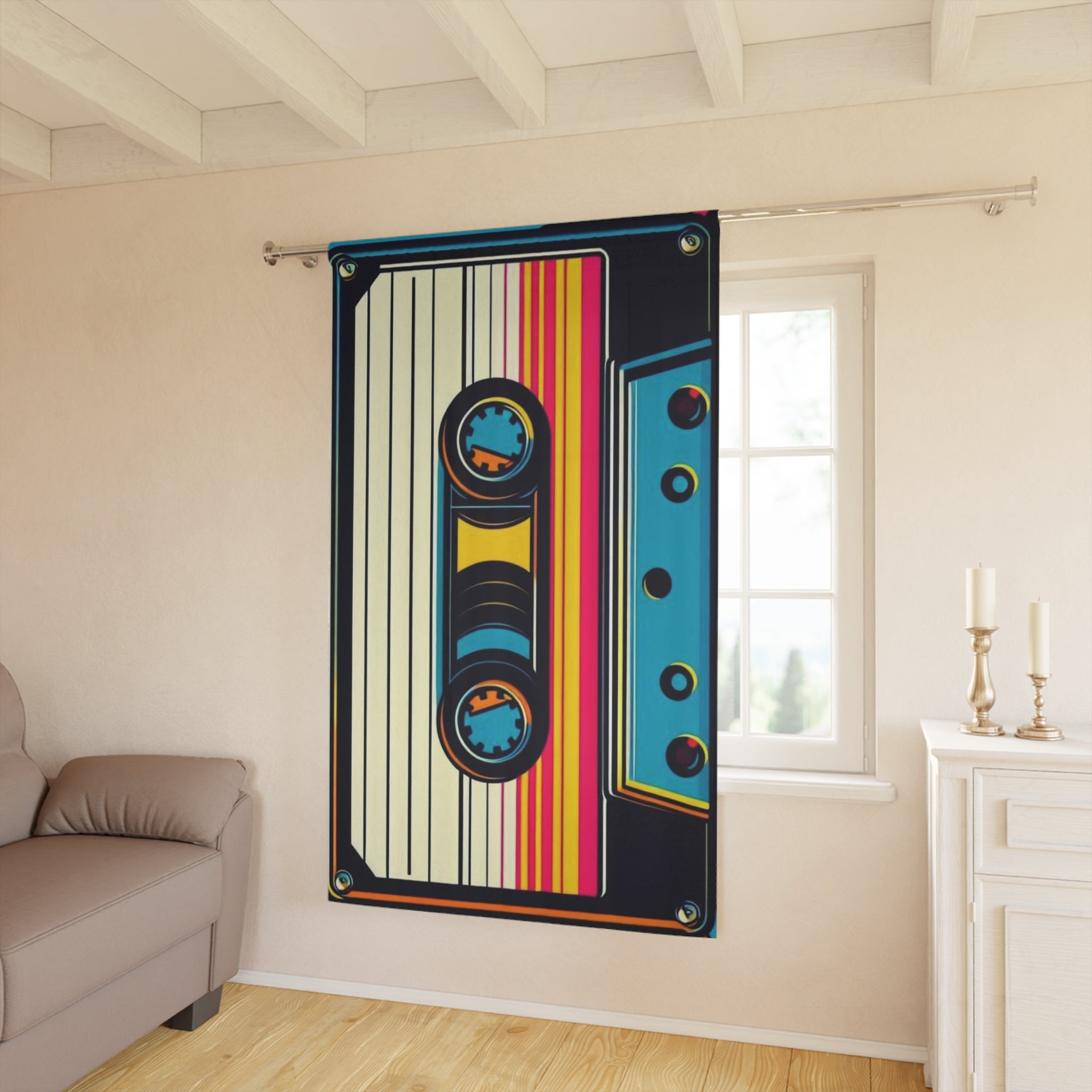 Tapestry with a colorful cassette tape design hanging on a wall in a room.