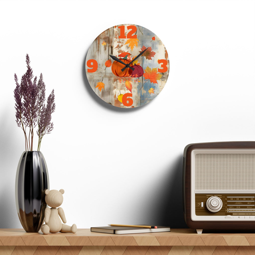 Decorative wall clock with autumn design on a shelf with a vase, teddy bear, and vintage radio.