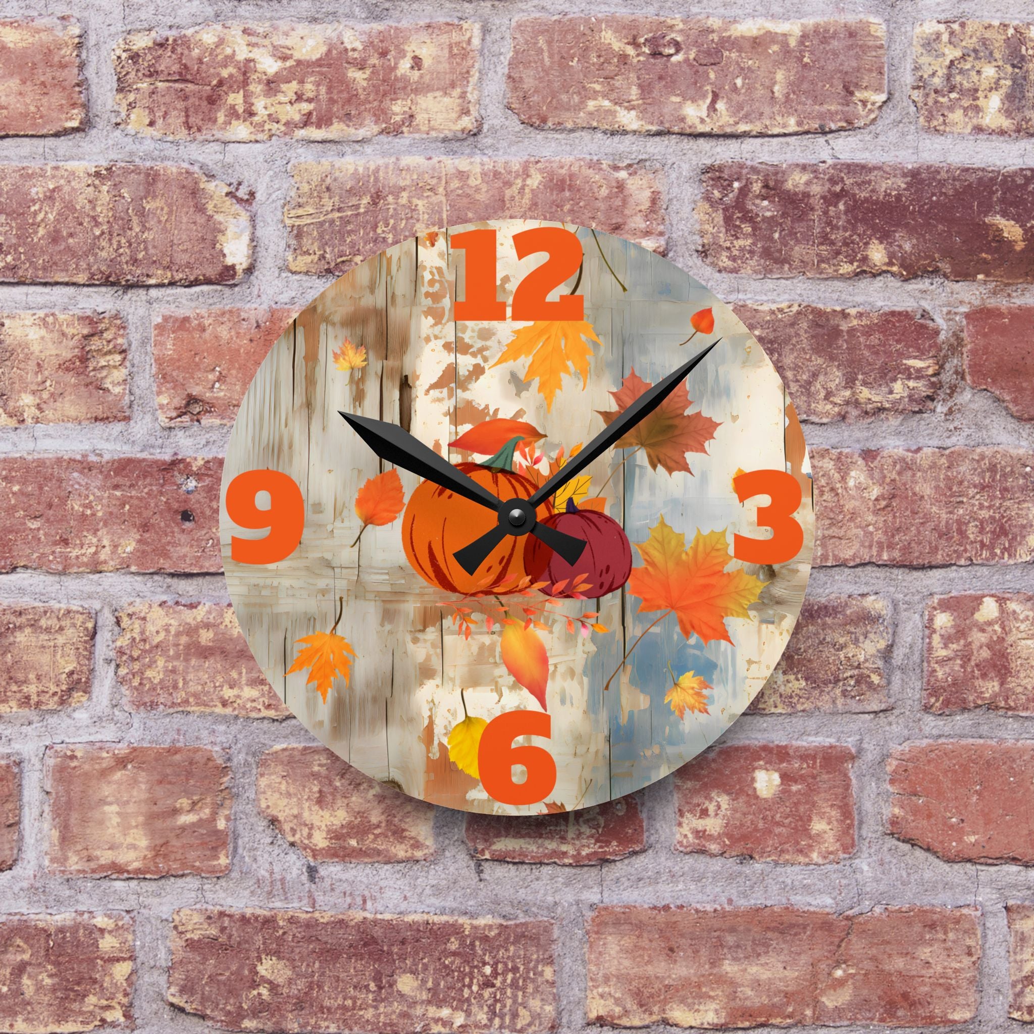 Decorative clock with autumn design on a brick wall