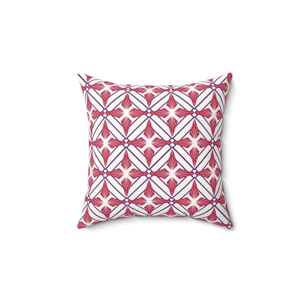 Decorative pillow with red and white geometric pattern on a white background