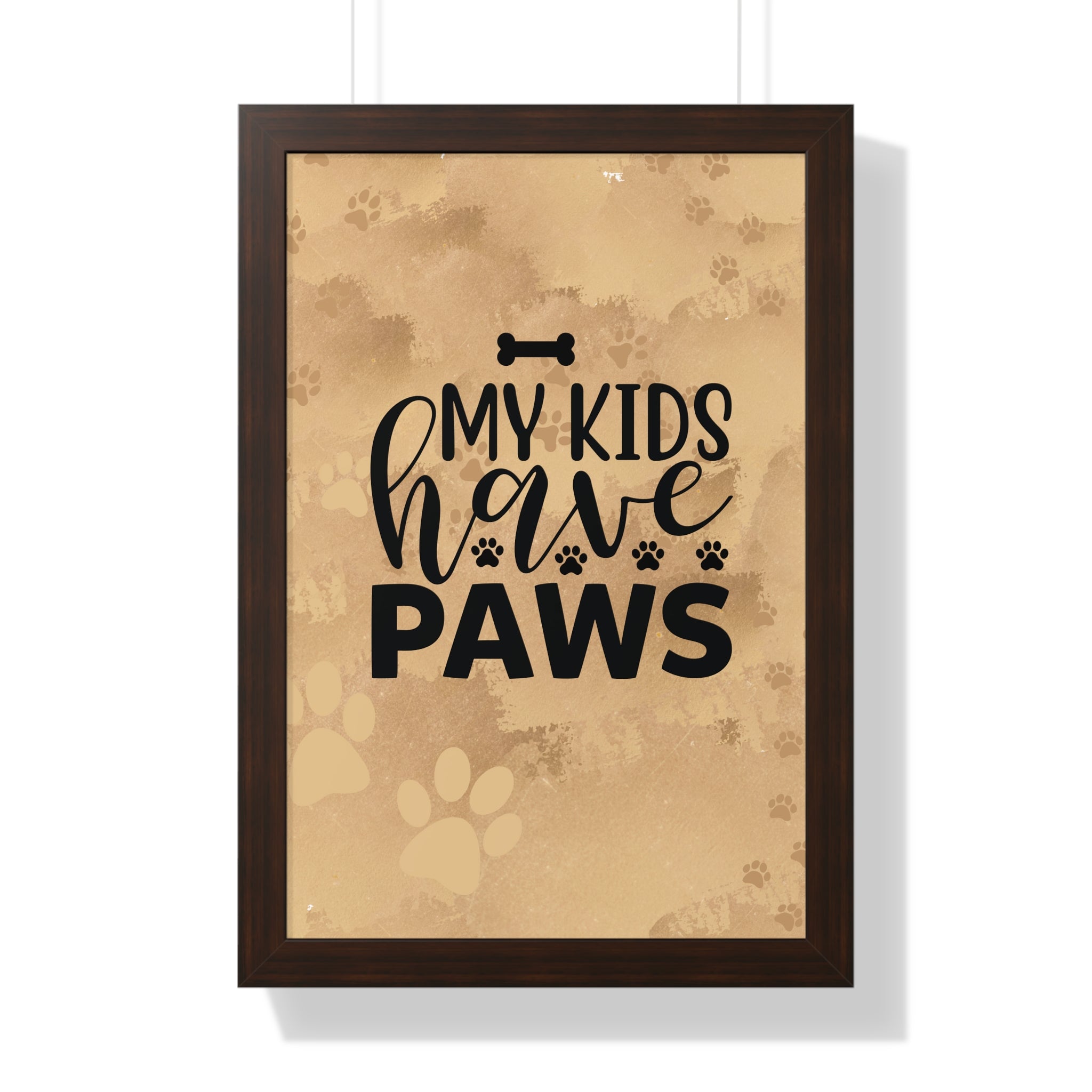 Framed poster with 'My kids have paws' text on a beige background with paw prints.