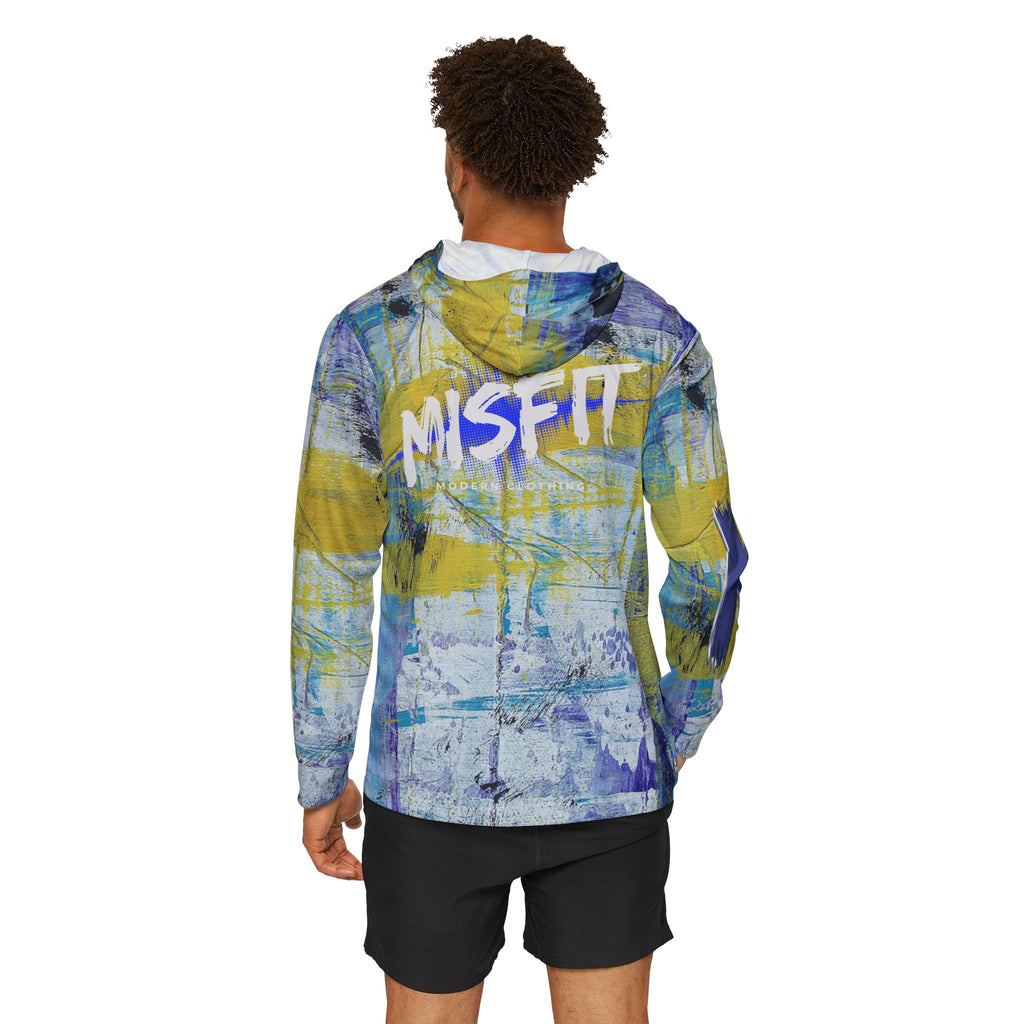 Person wearing a colorful jacket with 'MISFIT' branding on the back, standing against a white background.