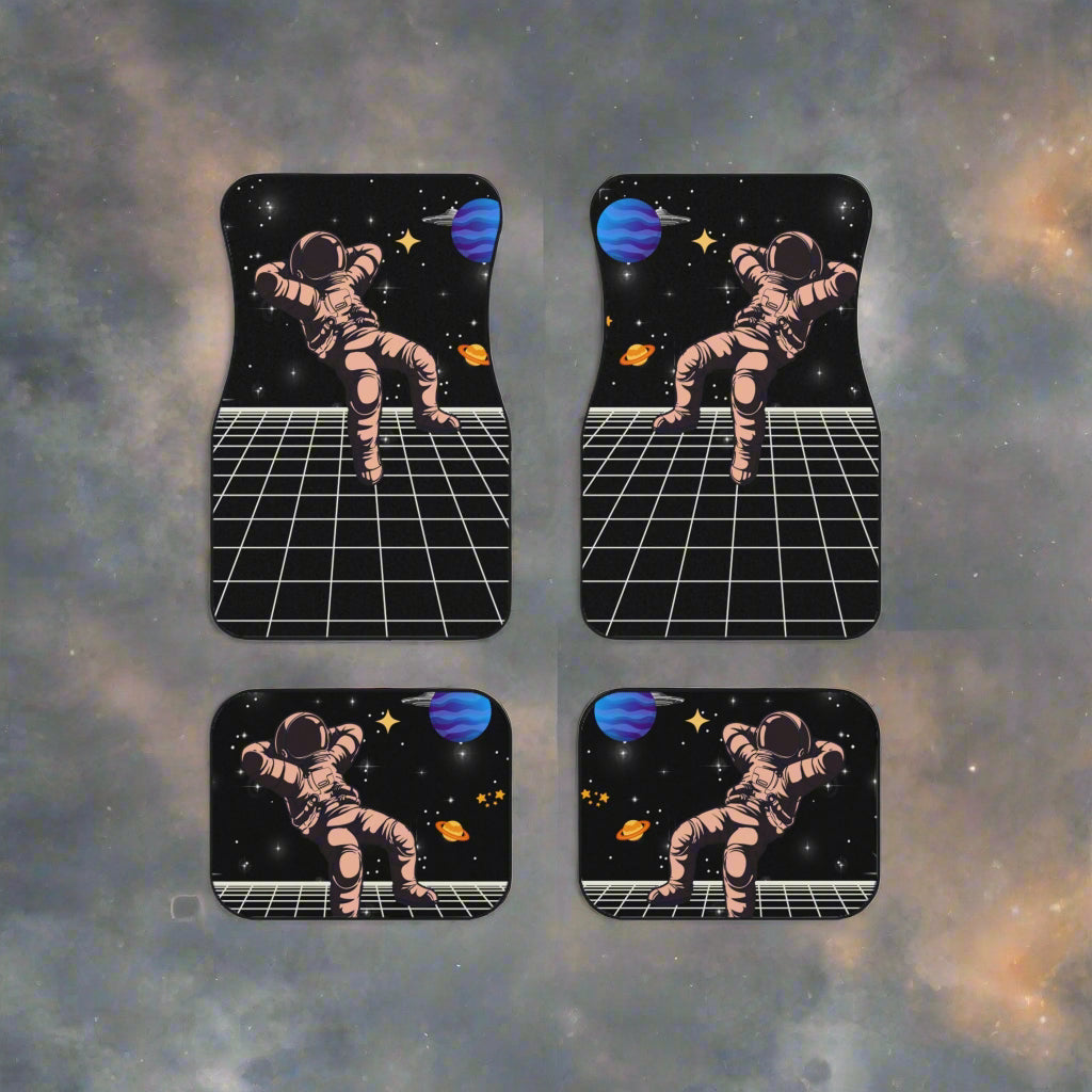 Four car mats with an astronaut design on a space-themed background