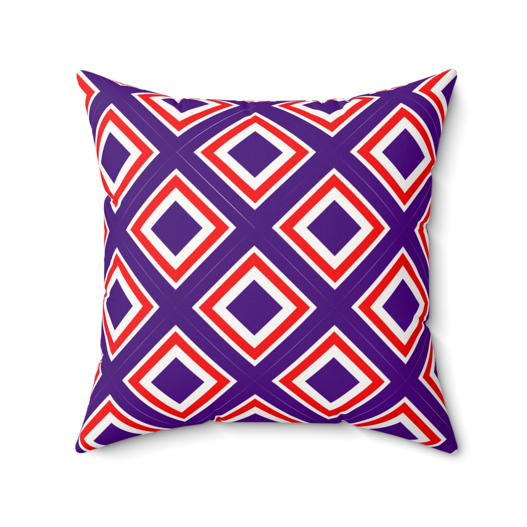 Decorative pillow with red and blue geometric pattern on a white background