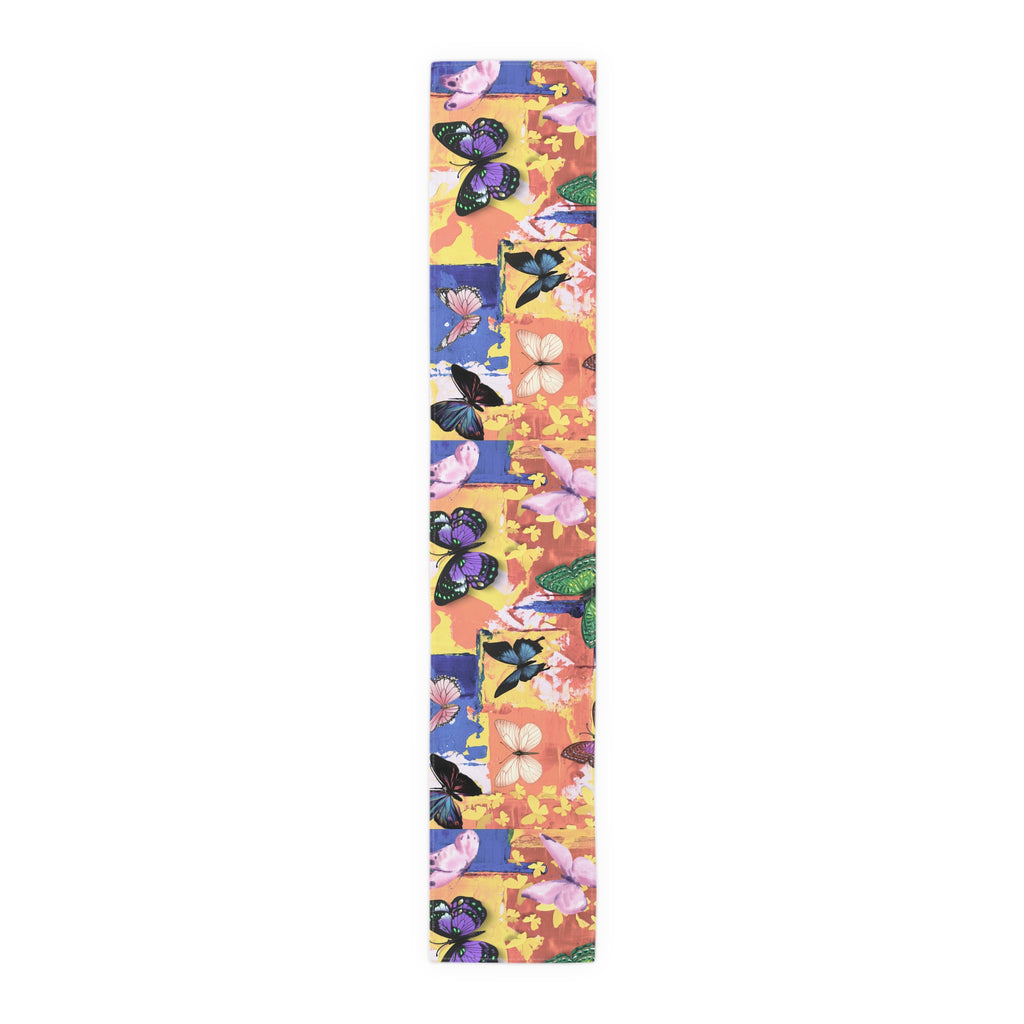 Colorful skateboard deck with butterfly and floral pattern on a white background