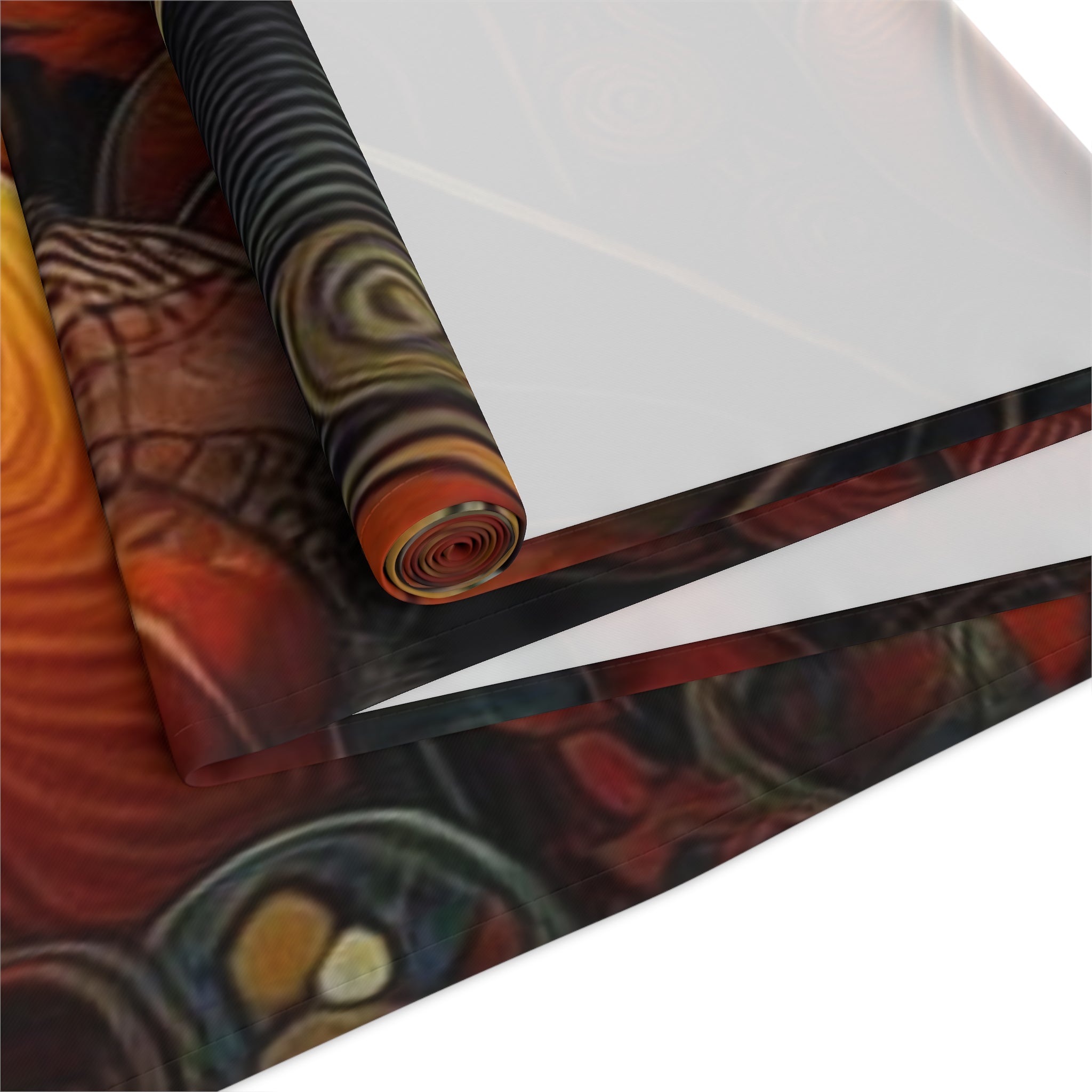 Roll of colorful patterned paper on a white background
