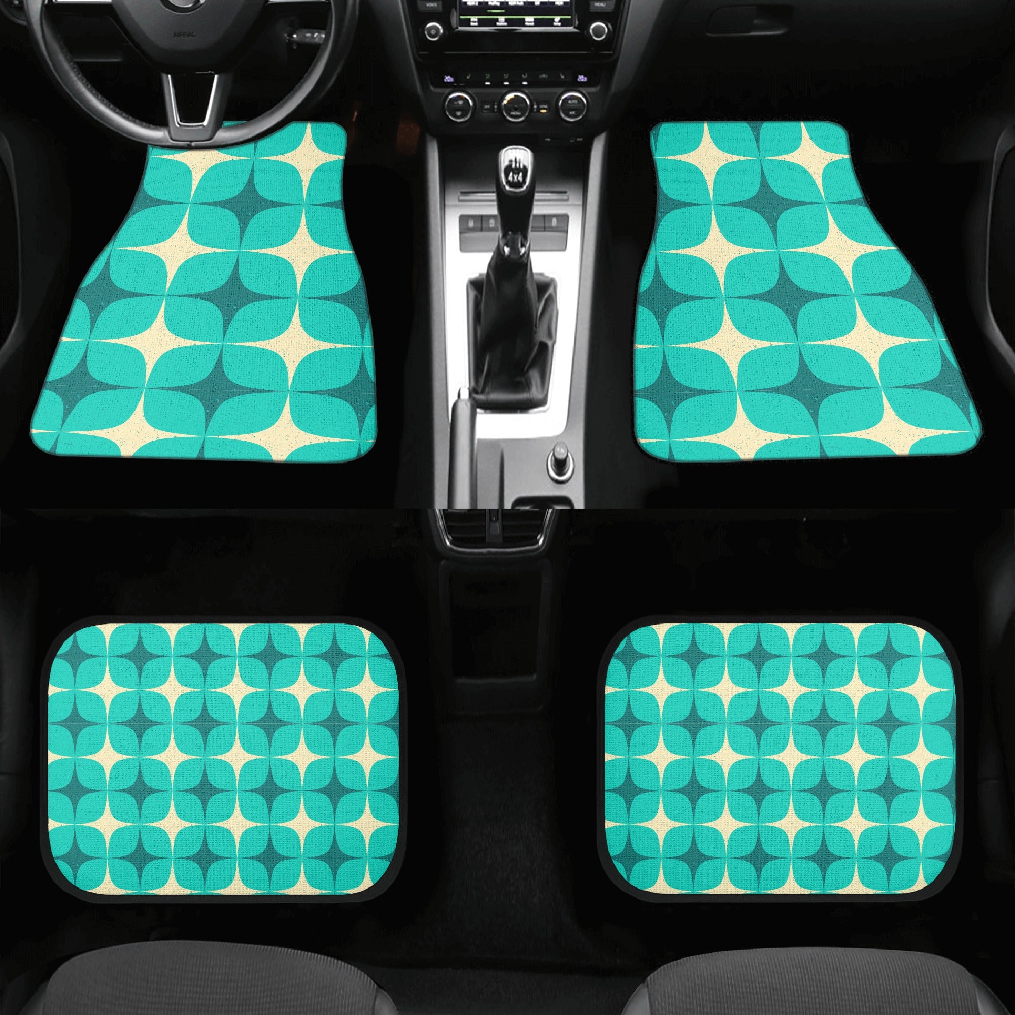 Set of teal and beige patterned car floor mats on a black car interior.