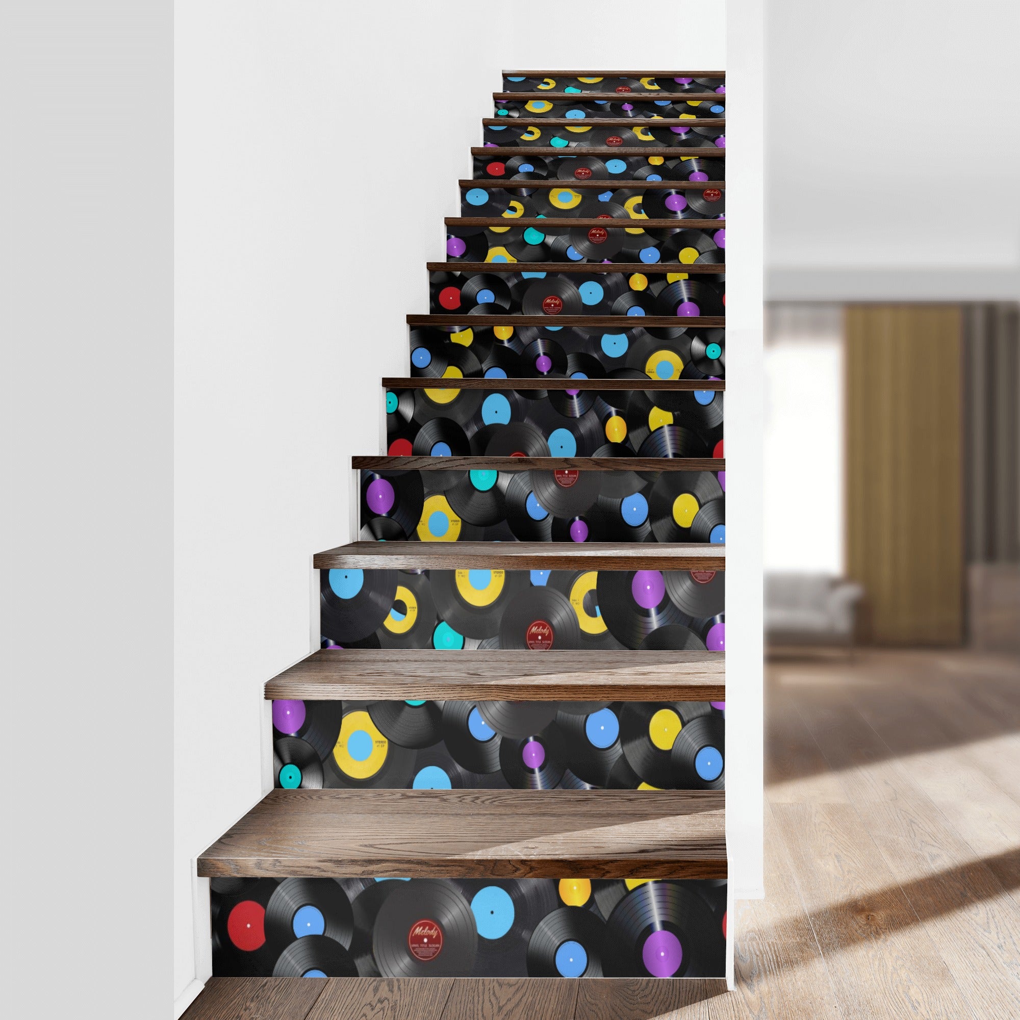 Staircase with vinyl record-themed decorative steps in a home setting