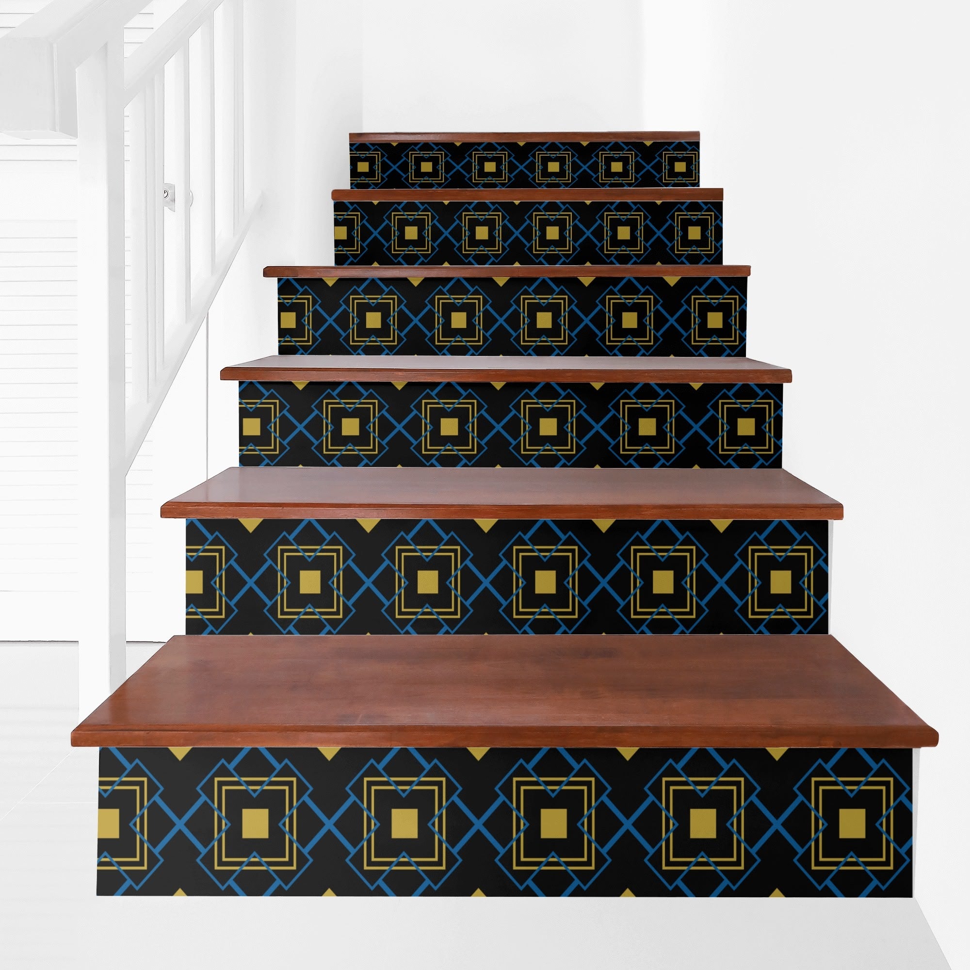 Staircase with decorative black and gold patterned steps on a white background