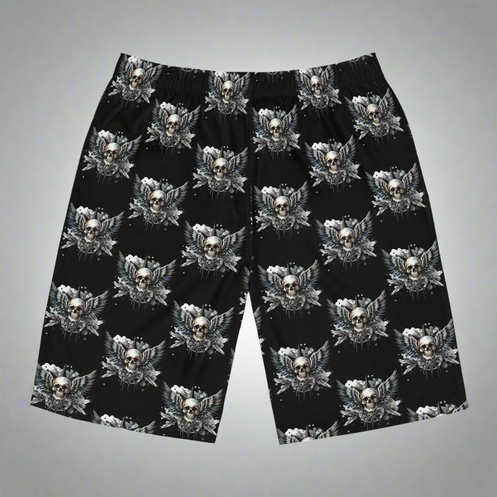 Black shorts with a pattern of skulls and wings on a white background