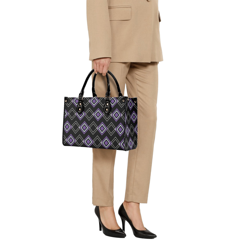 Person holding a patterned handbag with a plain background