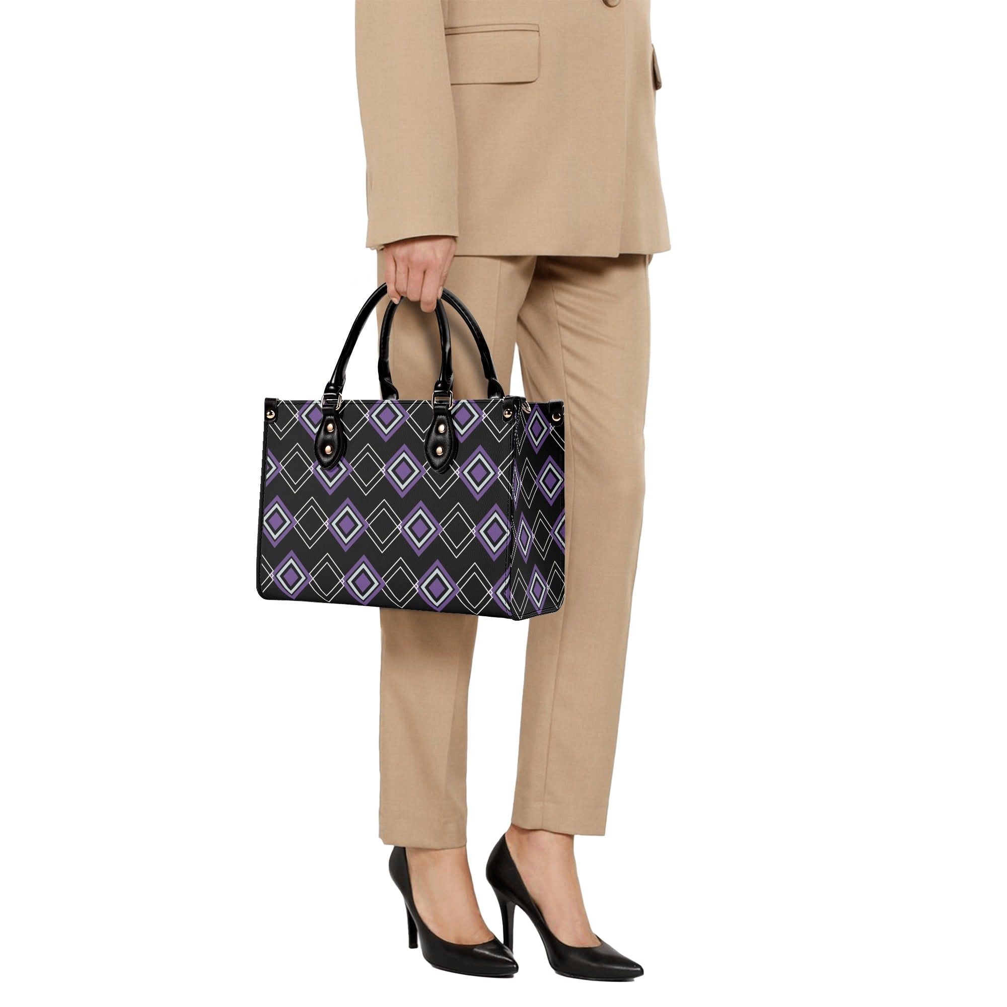 Person holding a patterned handbag with a plain background