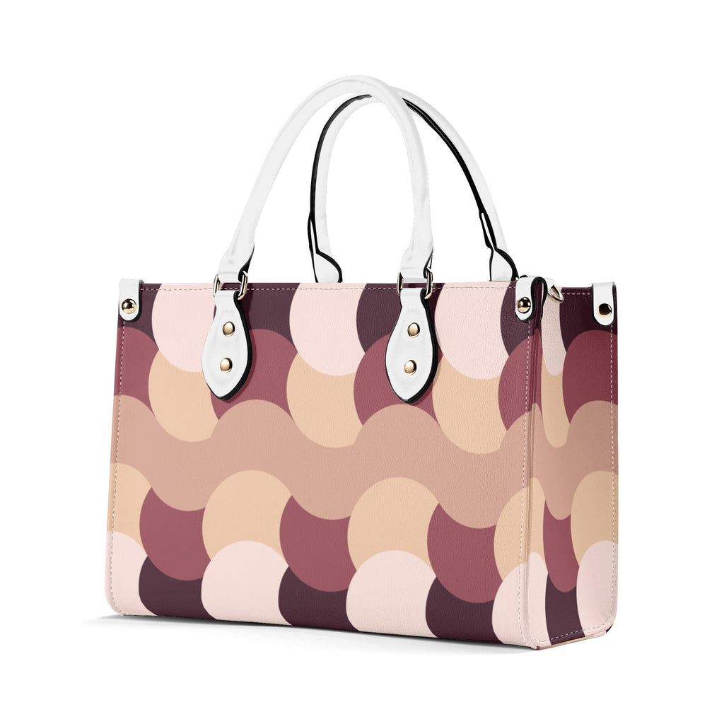 Handbag with a pattern of circular shapes on a white background