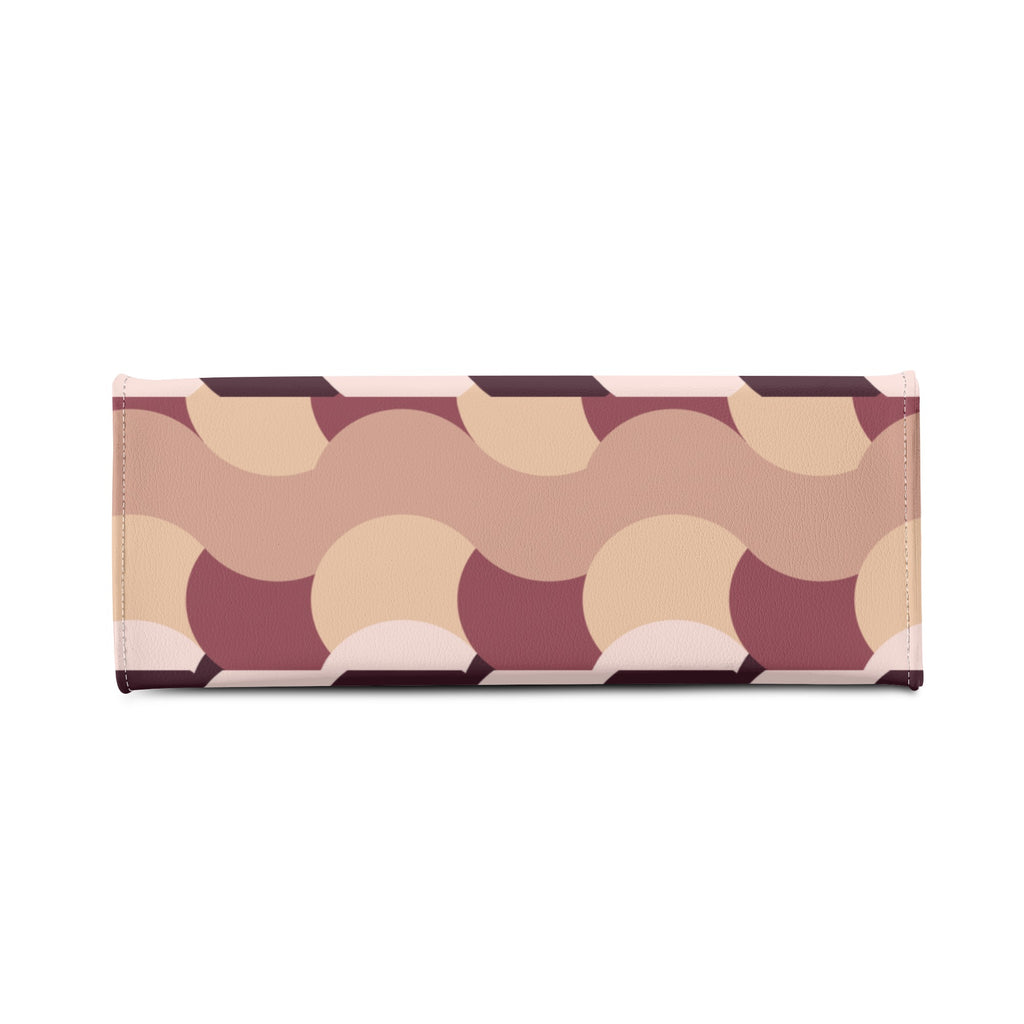 Patterned wallet with geometric design on a white background