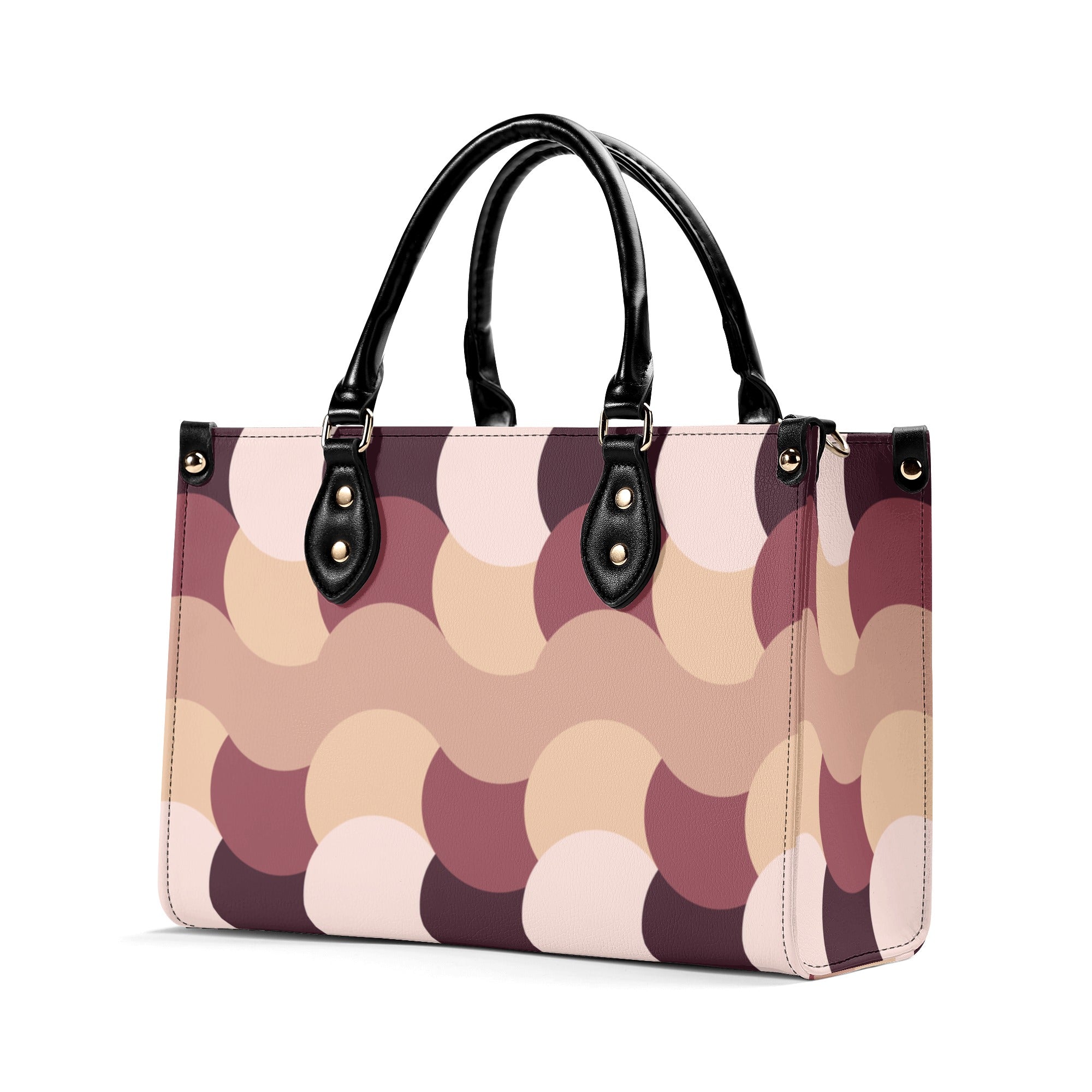 Patterned handbag with black handles on a white background