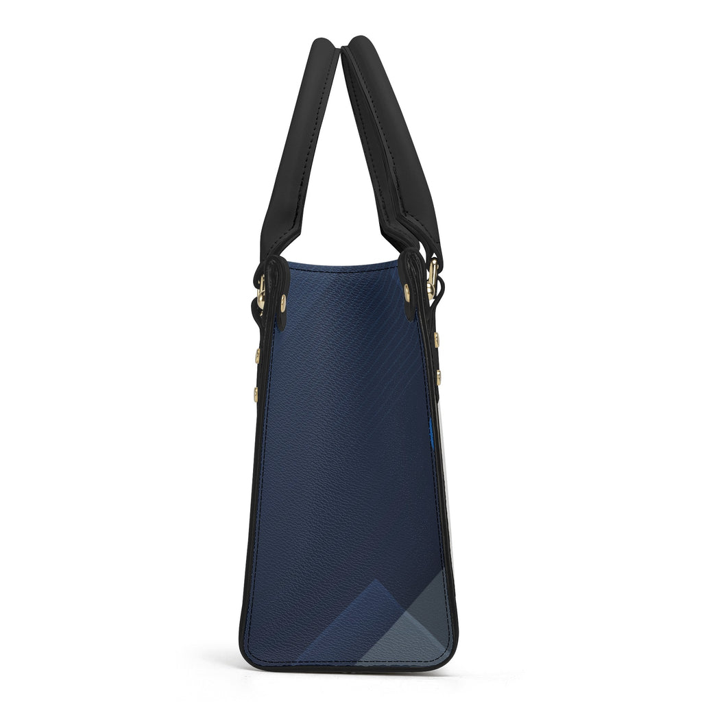 Blue handbag with black straps on a white background