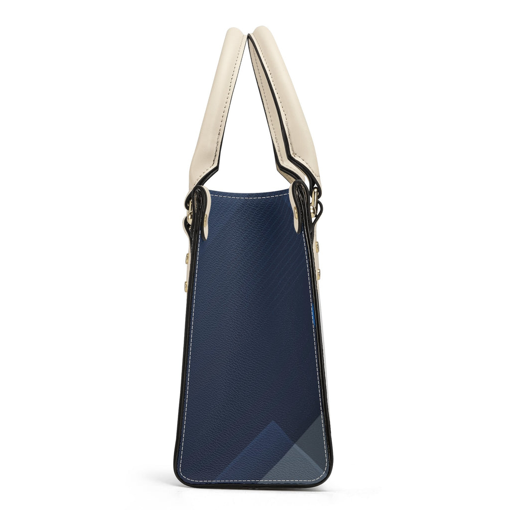 Blue handbag with beige handle on a white background