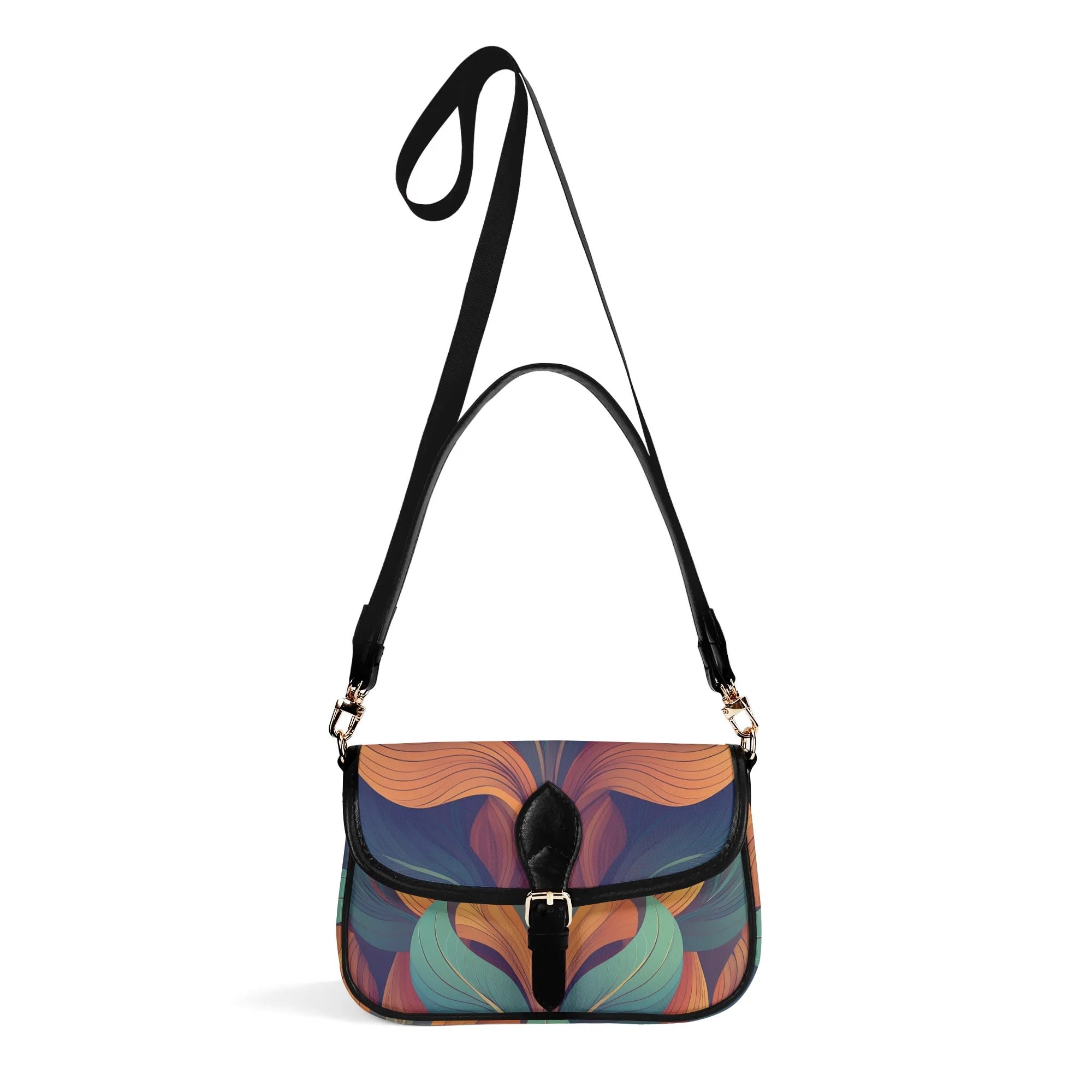 Multicolored patterned handbag with a black strap on a white background
