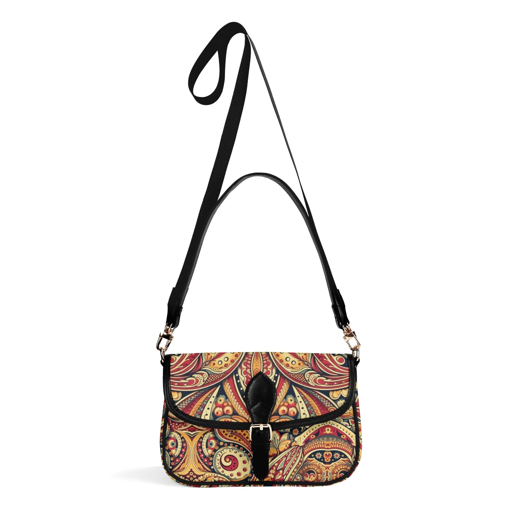 Multicolored patterned handbag with a black strap on a white background