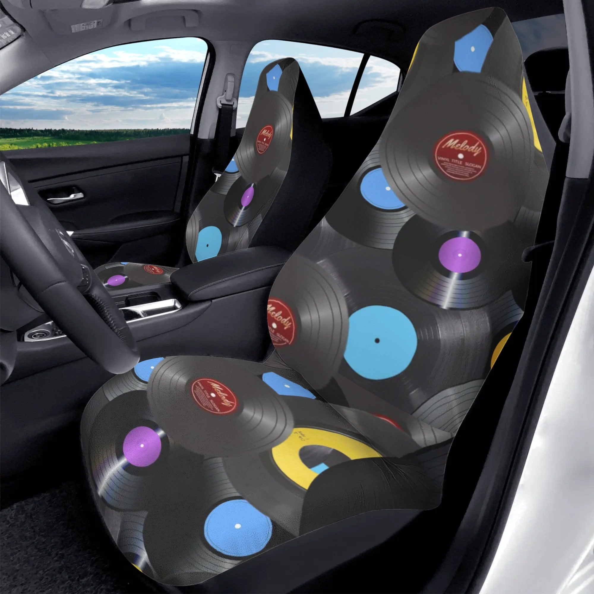 Car seat covers with vinyl record design in a vehicle interior