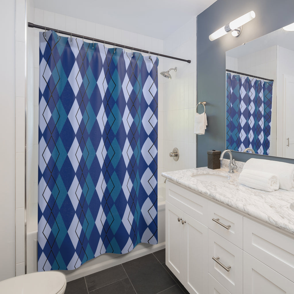 Bathroom with a blue and white patterned shower curtain, white vanity, and mirror.