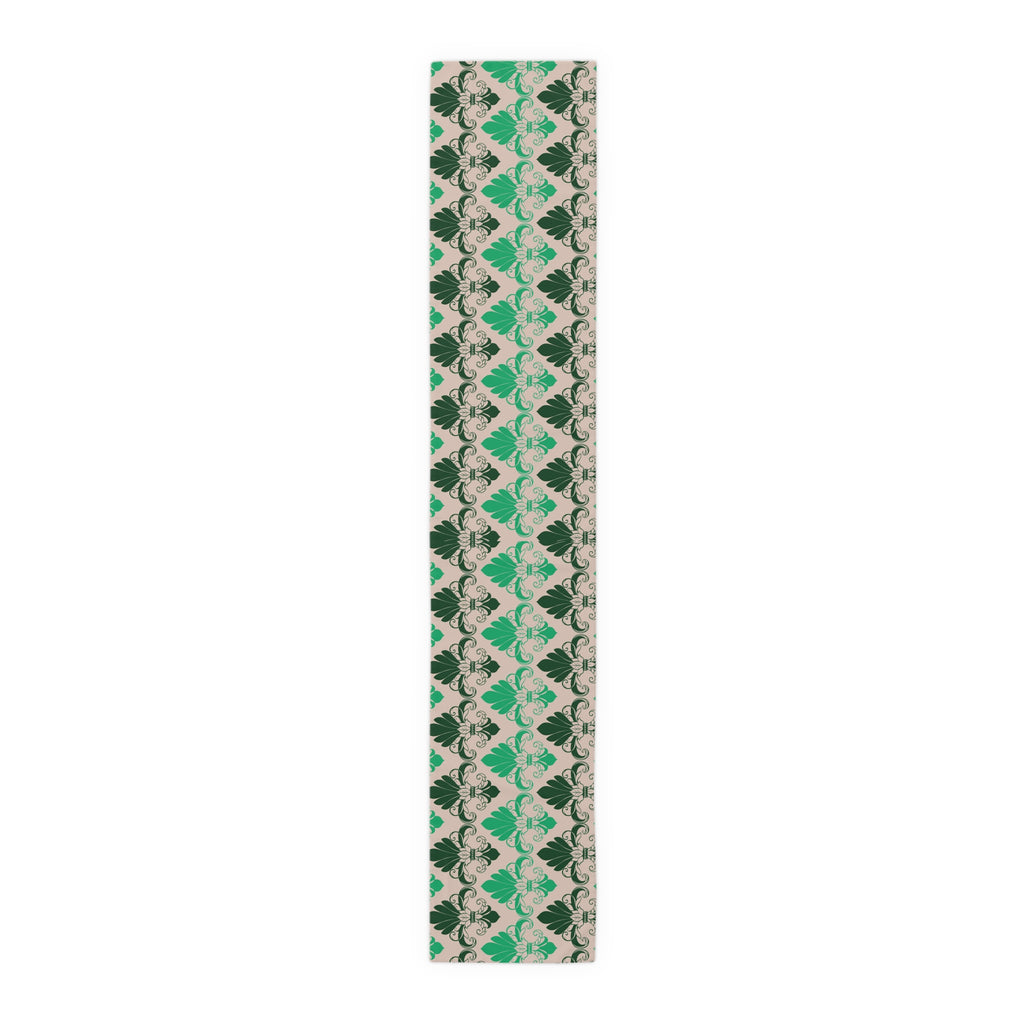Green and beige patterned scarf on a white background