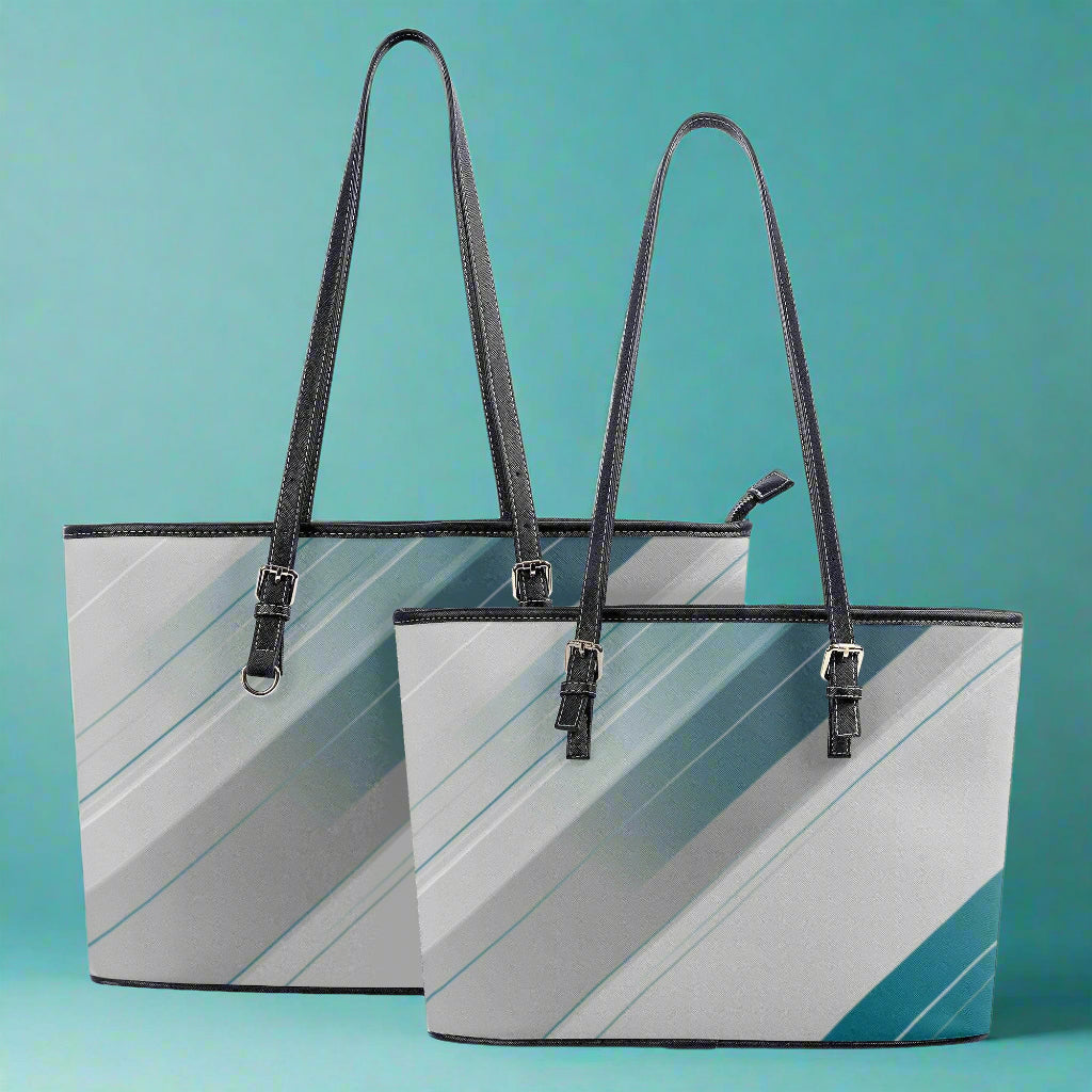 Two tote bags with diagonal stripe pattern on a white background