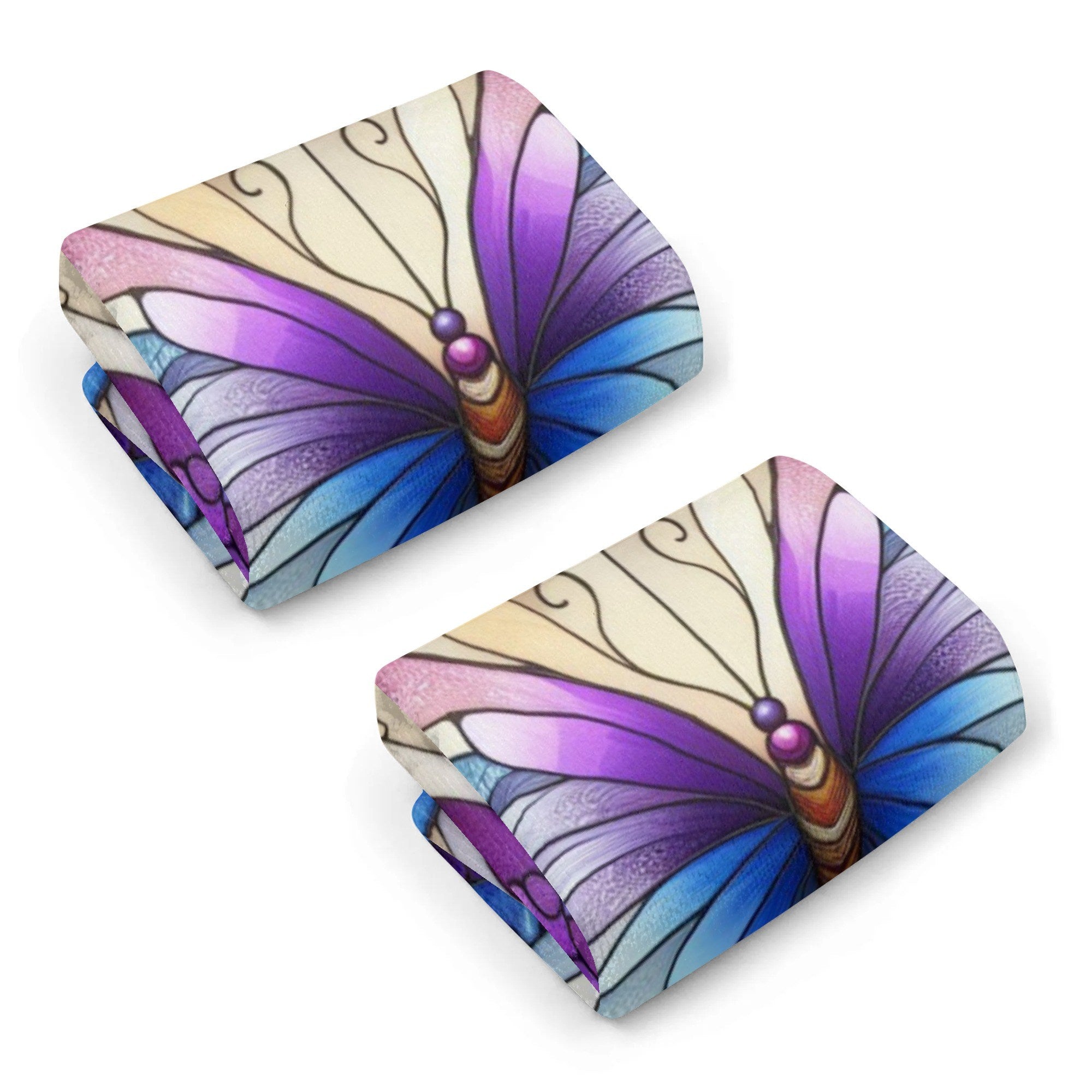 Two butterfly-patterned kitchen towels n a white background
