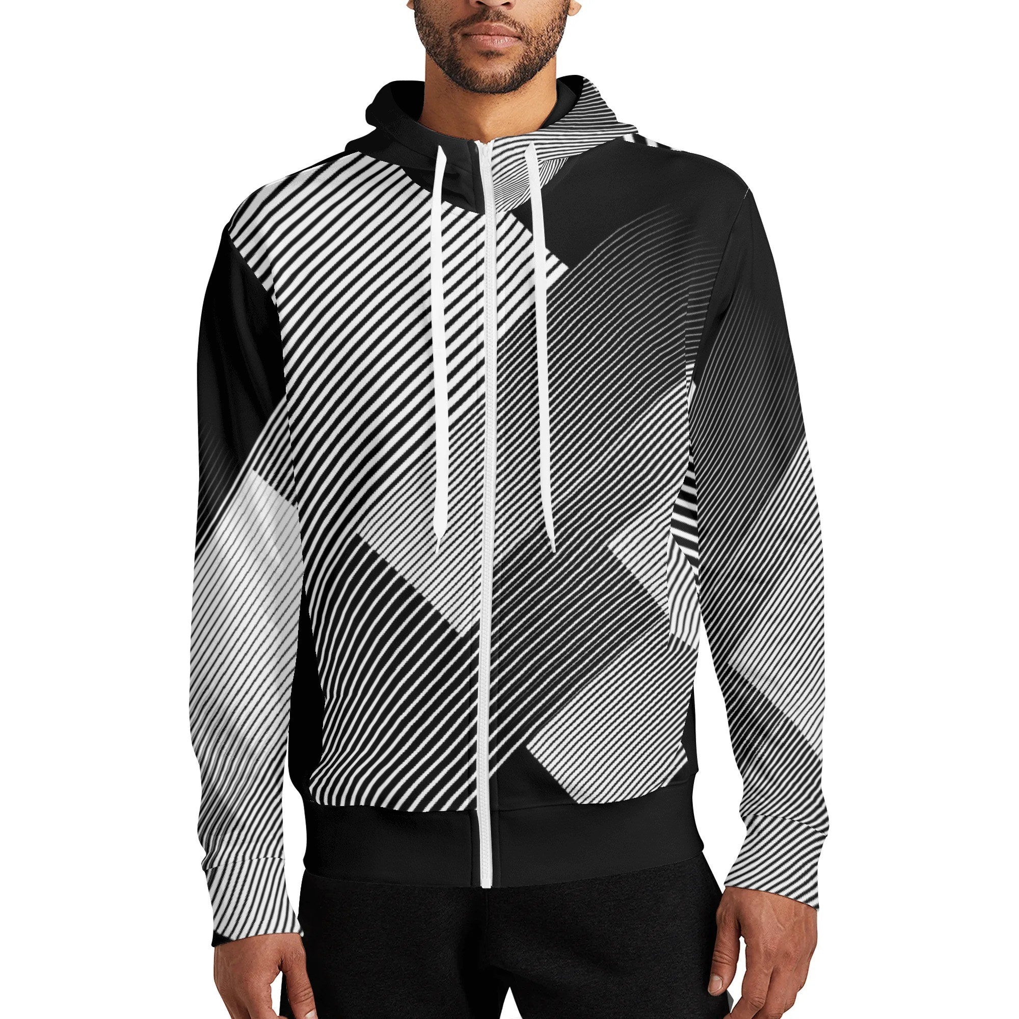 Black and white geometric patterned hoodie worn by a person on a white background