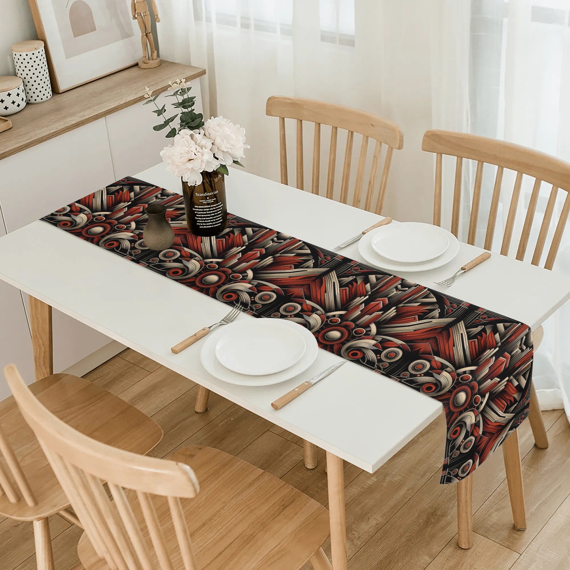 Dining table with a decorative table runner, plates, and cutlery in a well-lit room.