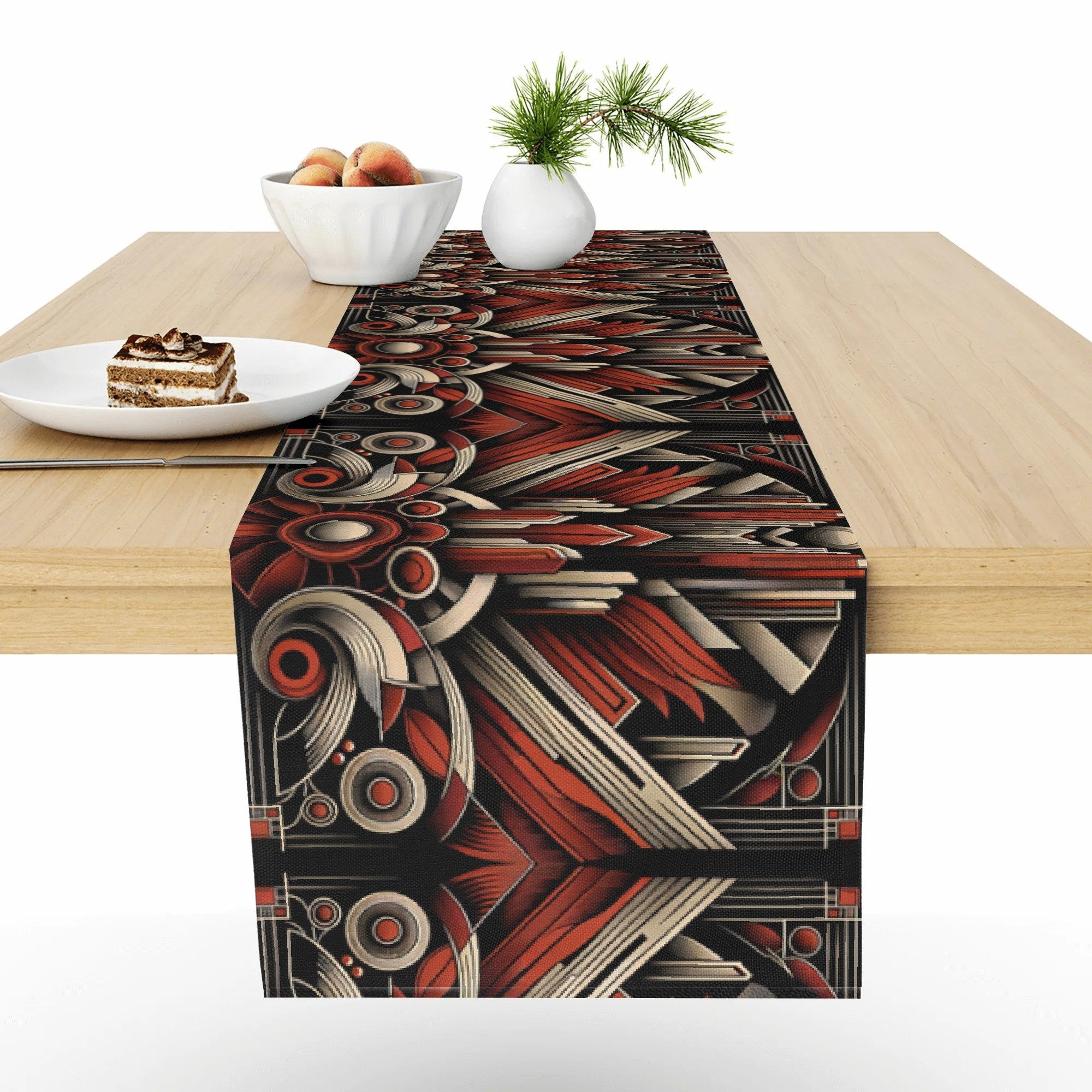Table runner with geometric pattern on a wooden table with food items.