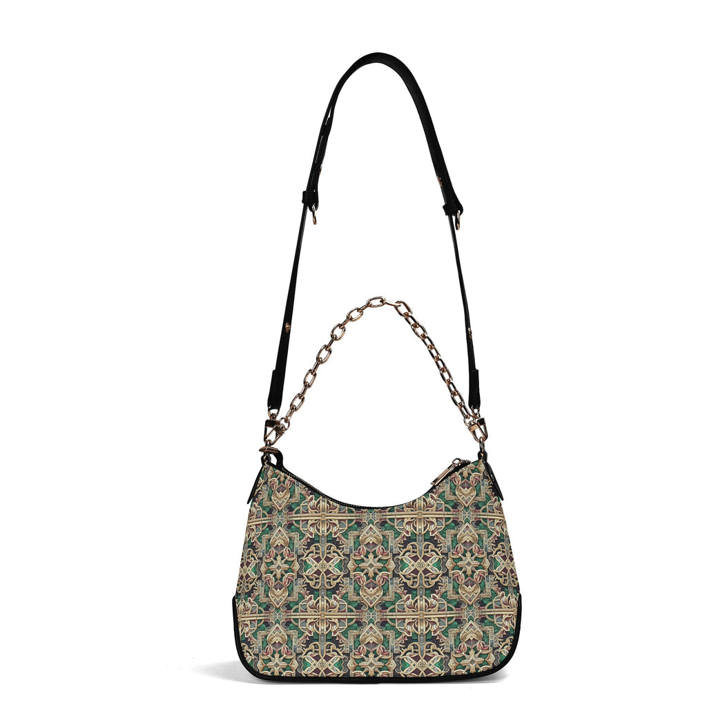 Patterned handbag with a chain detail on a white background