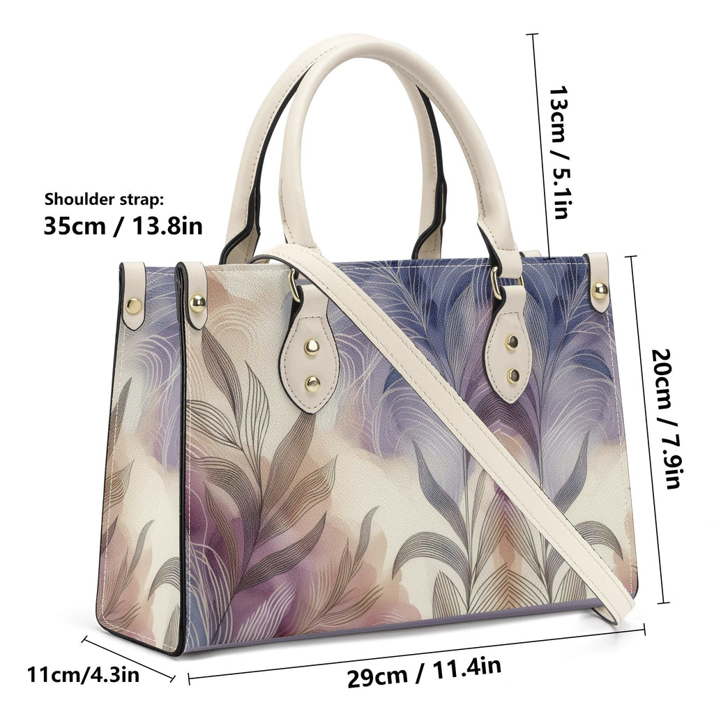 Handbag with feather pattern and measurements on a white background