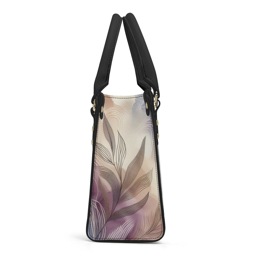 Handbag with leaf pattern on a white background