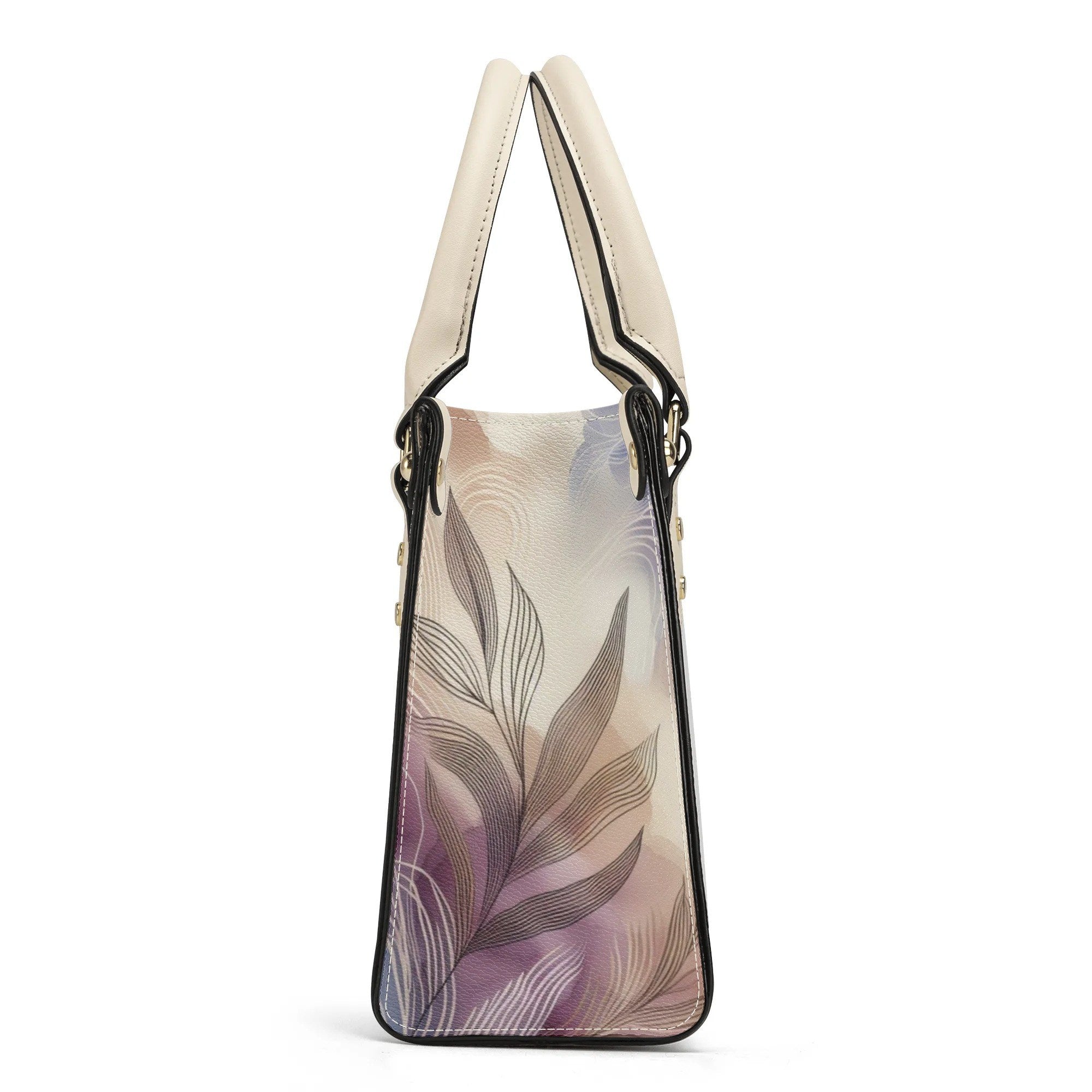 Handbag with leaf pattern on a white background