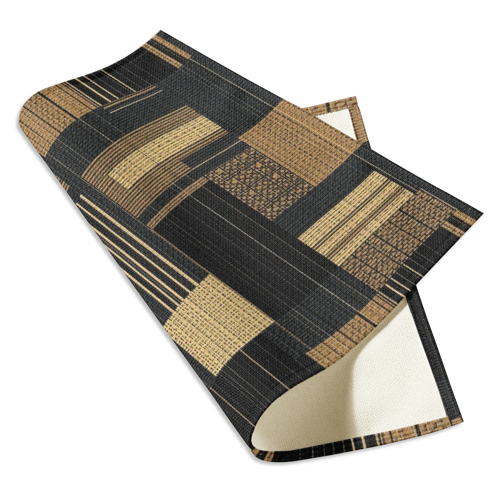 Two woven placemats with geometric pattern on a white background