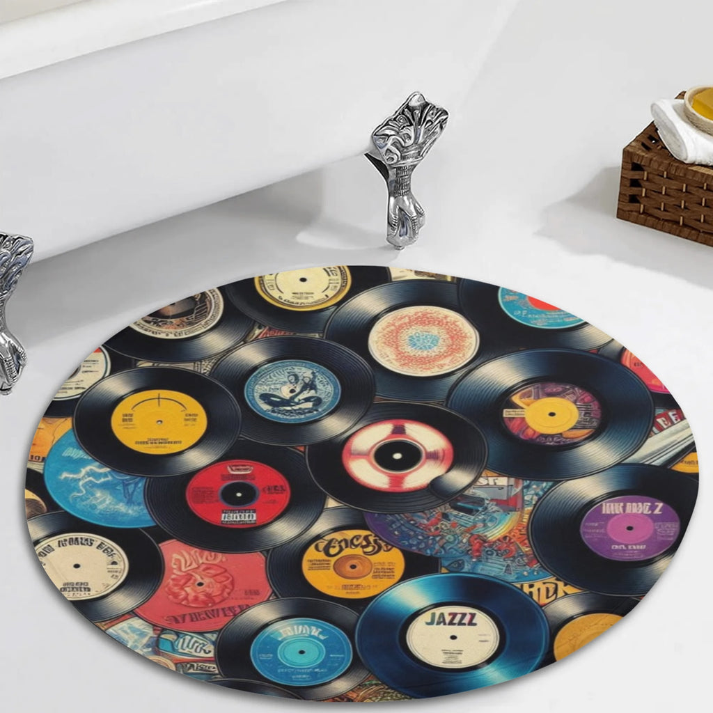 Round bath mat with vinyl record design on a bathtub.