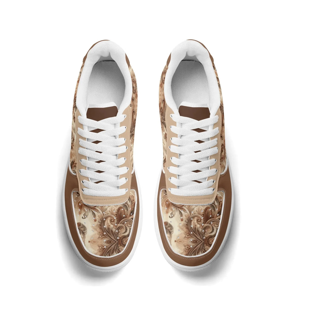 Pair of sneakers with brown floral patterns on a white background