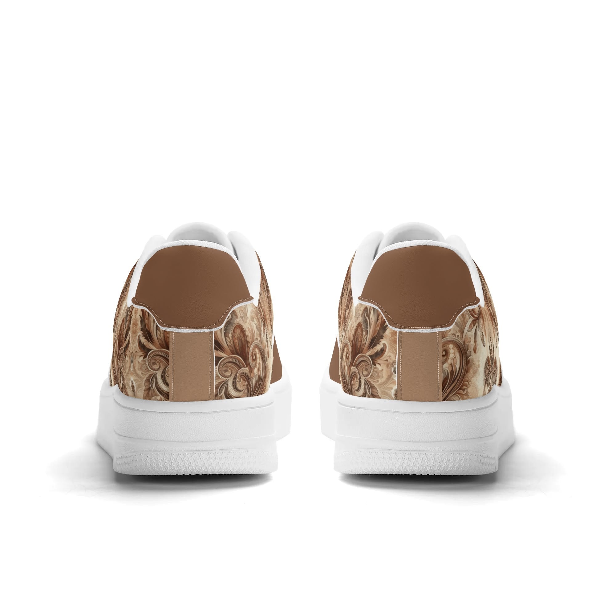 White sneakers with brown patterned soles on a white background