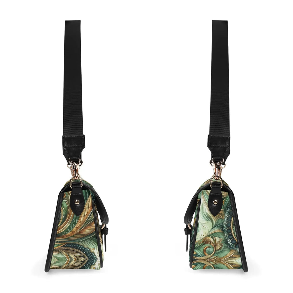 Two small handbags with green and gold feather pattern on a white background
