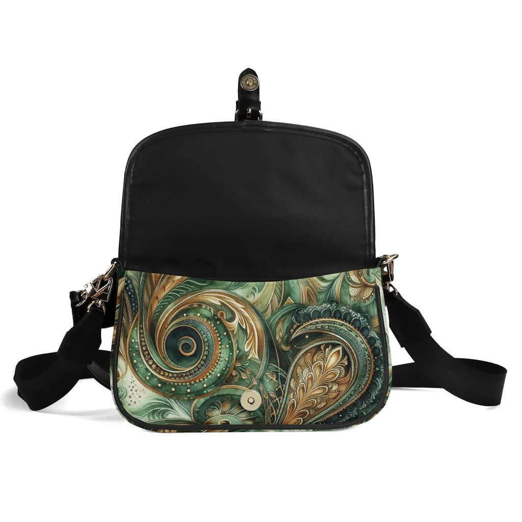Crossbody bag with green paisley pattern on a white background