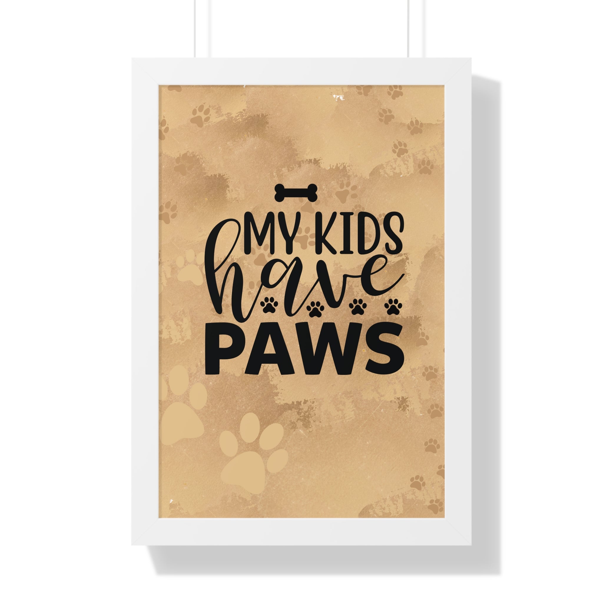 Framed print with 'My kids have paws' text on a brown background with paw prints.